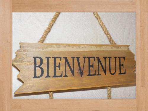a sign that says bernanke hanging on a wall at LES LILAS in Sainte-Marie-aux-Mines