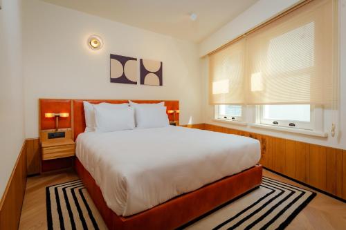 a bedroom with a large bed and a window at The Gift Hotel in Istanbul