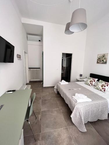 Ένα ή περισσότερα κρεβάτια σε δωμάτιο στο CapoDiLucca40