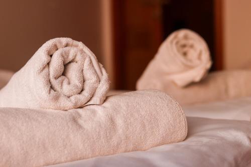 a close up of a towel on a bed at Stan na dan Sebastijan in Banja Luka
