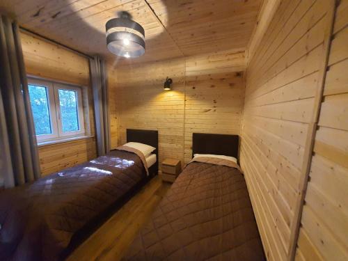 Katil atau katil-katil dalam bilik di Bukowa Ostoja