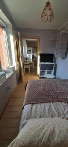 Ένα ή περισσότερα κρεβάτια σε δωμάτιο στο Casa in Centro Apartments and more