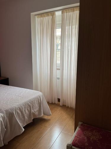 Postel nebo postele na pokoji v ubytování Pensión A Pedra