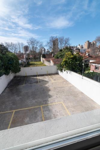 a view of a parking lot from a balcony at Asturiano 5 Miramar in Miramar