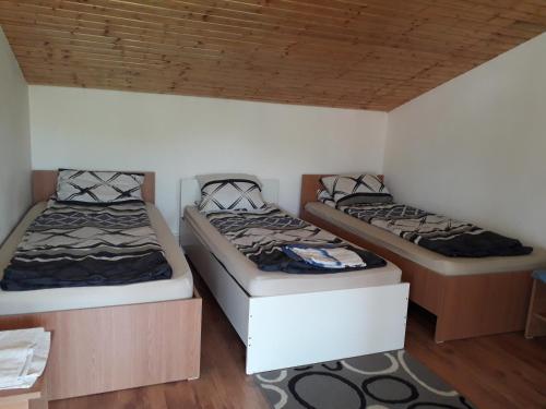 Giường trong phòng chung tại Casa Bia