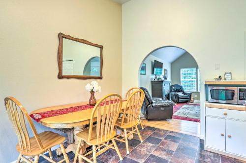 a dining room with a table and chairs at Charming Wasilla Retreat Walk to Lake Lalen! in Wasilla