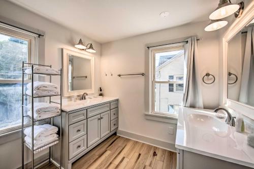 a bathroom with a sink and a mirror at Updated Ronks Home about 8 Mi to Dtwn Lancaster! in Ronks