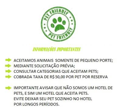 a green label with a paw print on it at Pousada Princesa Isabel - Visconde in Petrópolis