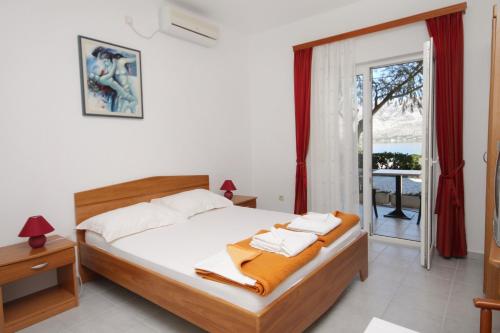 Katil atau katil-katil dalam bilik di Apartments and rooms by the sea Vinjerac, Zadar - 3248