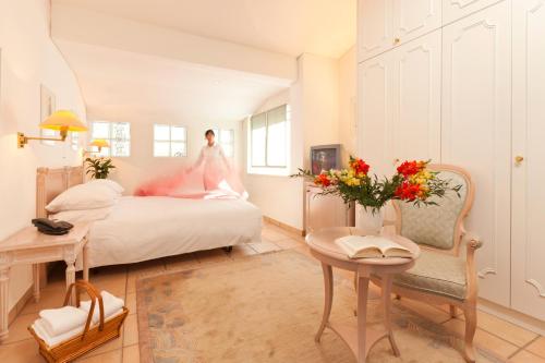 Ein Bett oder Betten in einem Zimmer der Unterkunft Hotel Tamaro