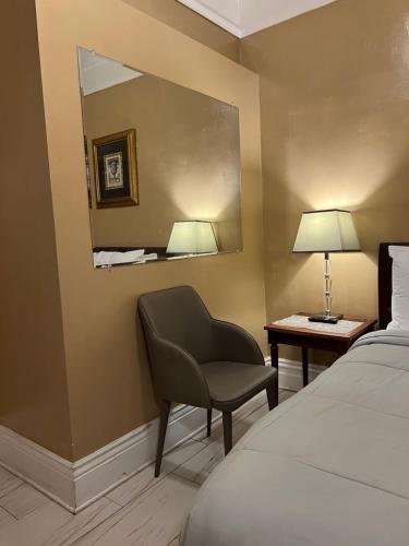 Katil atau katil-katil dalam bilik di Luz Hotel