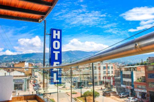 a view of a city with a hollywood sign at Holly Hotel in Duitama
