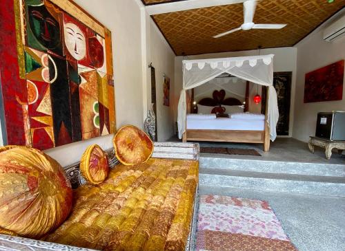 Ένα ή περισσότερα κρεβάτια σε δωμάτιο στο Villa Kalisat Resort