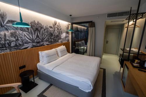Ένα ή περισσότερα κρεβάτια σε δωμάτιο στο Zimmer Bosphorus Hotel