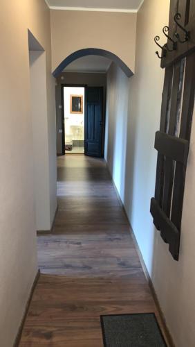 a hallway leading to a room with a door at K76 - Very Nice 2-bedrooms Apartment -2 big beds-1 single bed in Tartu