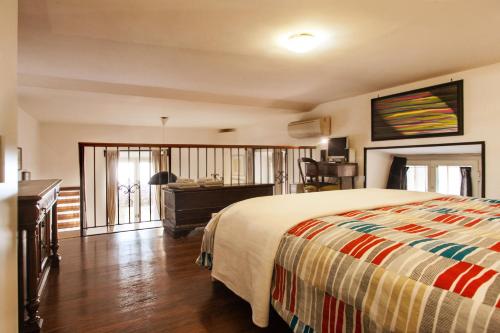 Una cama o camas en una habitación de Ninohouse