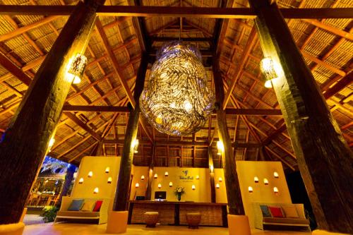 a large chandelier hanging from the ceiling of a building at Tinkerbell Resort @ Koh Kood in Ko Kood