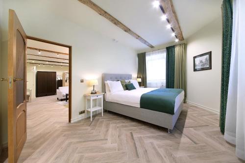 Postel nebo postele na pokoji v ubytování Taurakalnis apartment