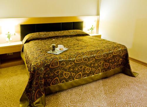 Postel nebo postele na pokoji v ubytování Adrina Termal Health & SPA Hotel