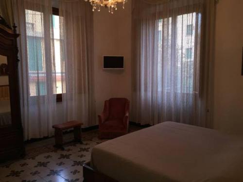 Ένα ή περισσότερα κρεβάτια σε δωμάτιο στο Villa Puccini