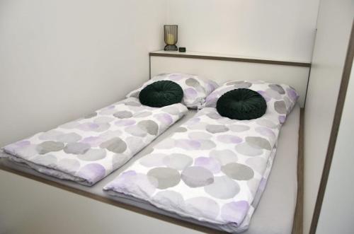Postel nebo postele na pokoji v ubytování Sky Thermal Apartment