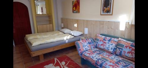 Postel nebo postele na pokoji v ubytování Studio Nandagon Gasthouse