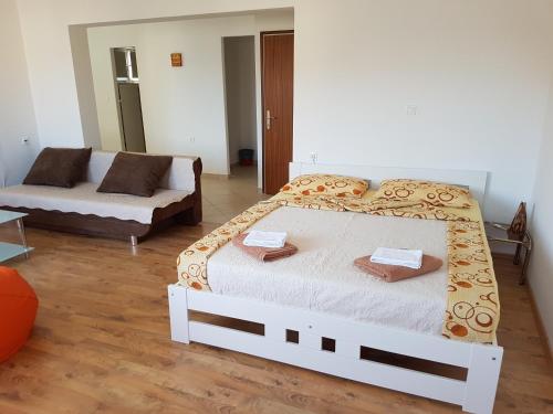 Posteľ alebo postele v izbe v ubytovaní Apartmani LuMa Apartman Marija