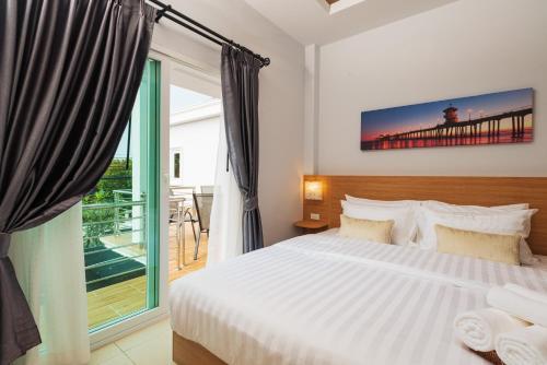 Postel nebo postele na pokoji v ubytování Grand Gala Villa