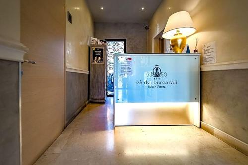 a room with a large sign on the wall at Cà Dei Barcaroli in Mestre