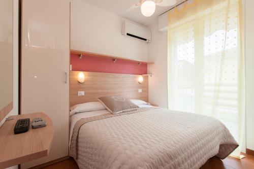 Postel nebo postele na pokoji v ubytování B&B Airone Cervia - Camere e Appartamenti