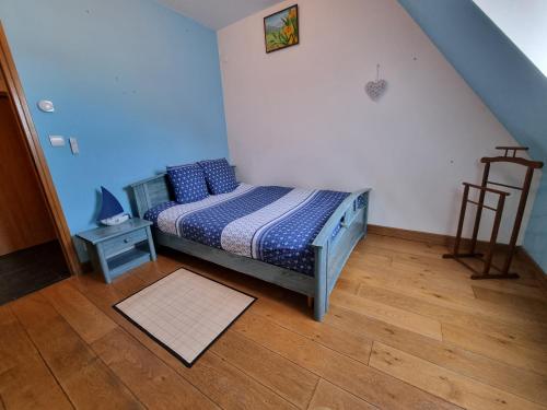 Кровать или кровати в номере Appartement familial avec balcon