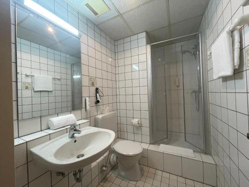 Koupelna v ubytování Hotel Walzwerk