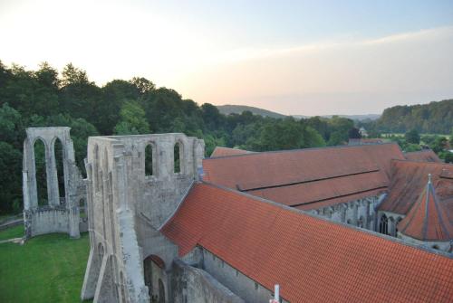 an aerial view of a building with red roofs at Ferienwohnung-Stricker-Bad-Sachsa in Bad Sachsa