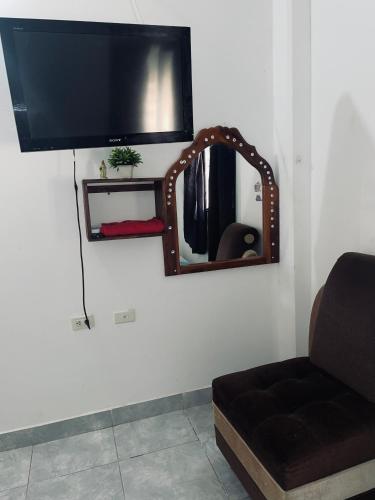 Μια τηλεόραση ή/και κέντρο ψυχαγωγίας στο casa amoblada, Doradal Antioquia, Santorini colombiano