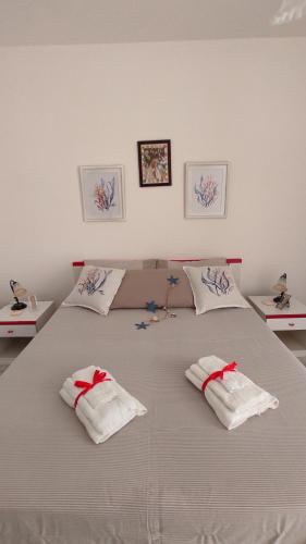 Postel nebo postele na pokoji v ubytování Casa Rosa