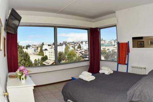 Ένα ή περισσότερα κρεβάτια σε δωμάτιο στο Vista II Apartments