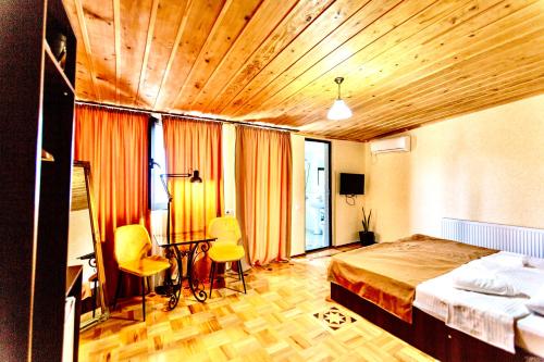 Postel nebo postele na pokoji v ubytování Hotel History