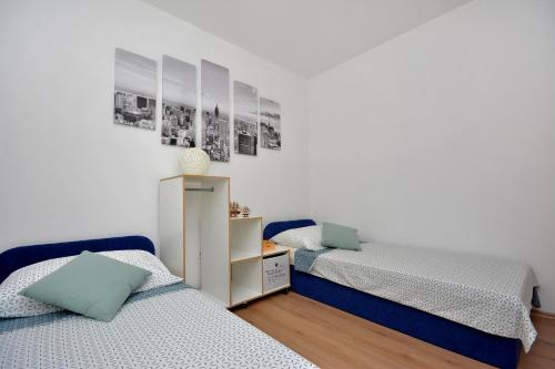 Posteľ alebo postele v izbe v ubytovaní Apartment Wild Rose