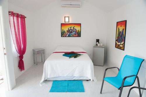 Cosmopolitan Guesthouse tesisinde bir odada yatak veya yataklar