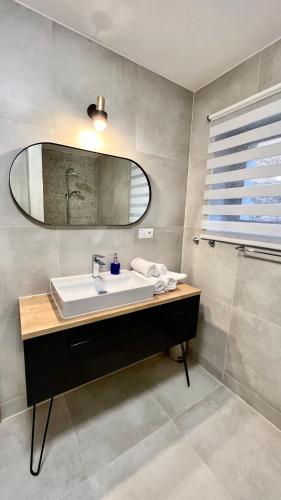 Kúpeľňa v ubytovaní Apartament 21 (1)