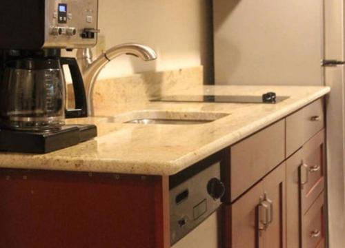 a kitchen with a sink and a counter top at Deer Haven Apartment in Bellingham