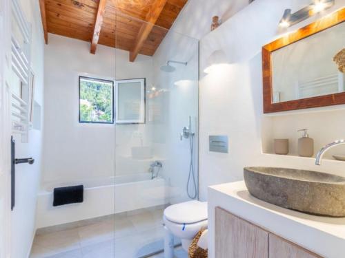 a bathroom with a sink and a shower and a toilet at Scenic Villa, Costa Blanca in Denia