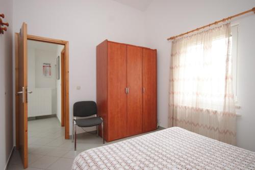 Posteľ alebo postele v izbe v ubytovaní Apartment Nerezine 3451c
