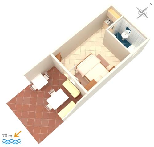 planta de una habitación con dormitorio en Apartments by the sea Pisak, Omis - 2750, en Pisak
