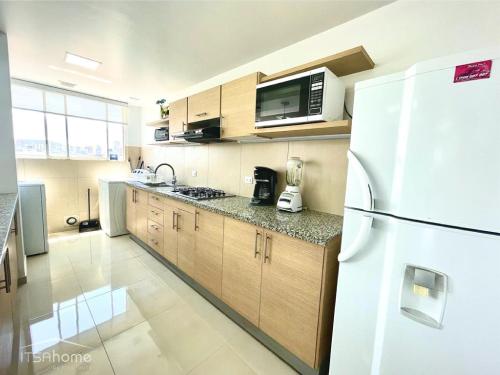 Kuchyň nebo kuchyňský kout v ubytování ItsaHome Apartments - Torre Seis