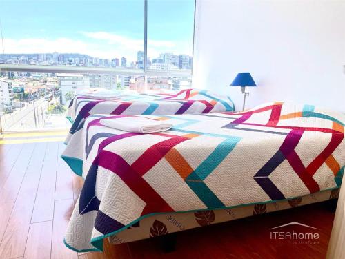 Postel nebo postele na pokoji v ubytování ItsaHome Apartments - Torre Seis