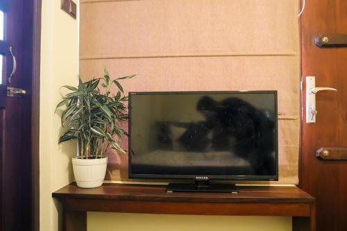 TV a/nebo společenská místnost v ubytování Misty Villas