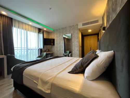 Katil atau katil-katil dalam bilik di Avni Bey Otel