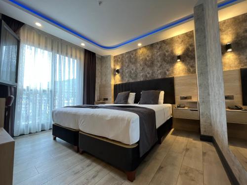 Katil atau katil-katil dalam bilik di Avni Bey Otel