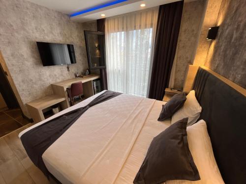 Katil atau katil-katil dalam bilik di Avni Bey Otel